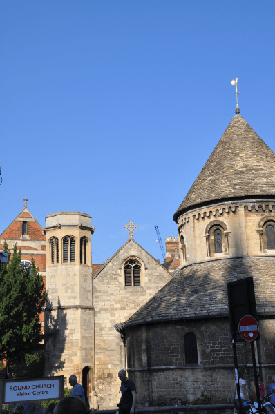 A rectangular crane behind the round church